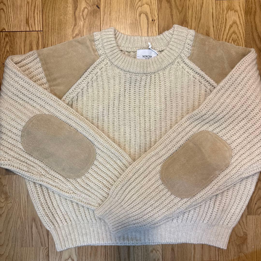 新品・未使用】NOKCHA ベージュ ニットセーター 肘パッチ付き - メルカリ