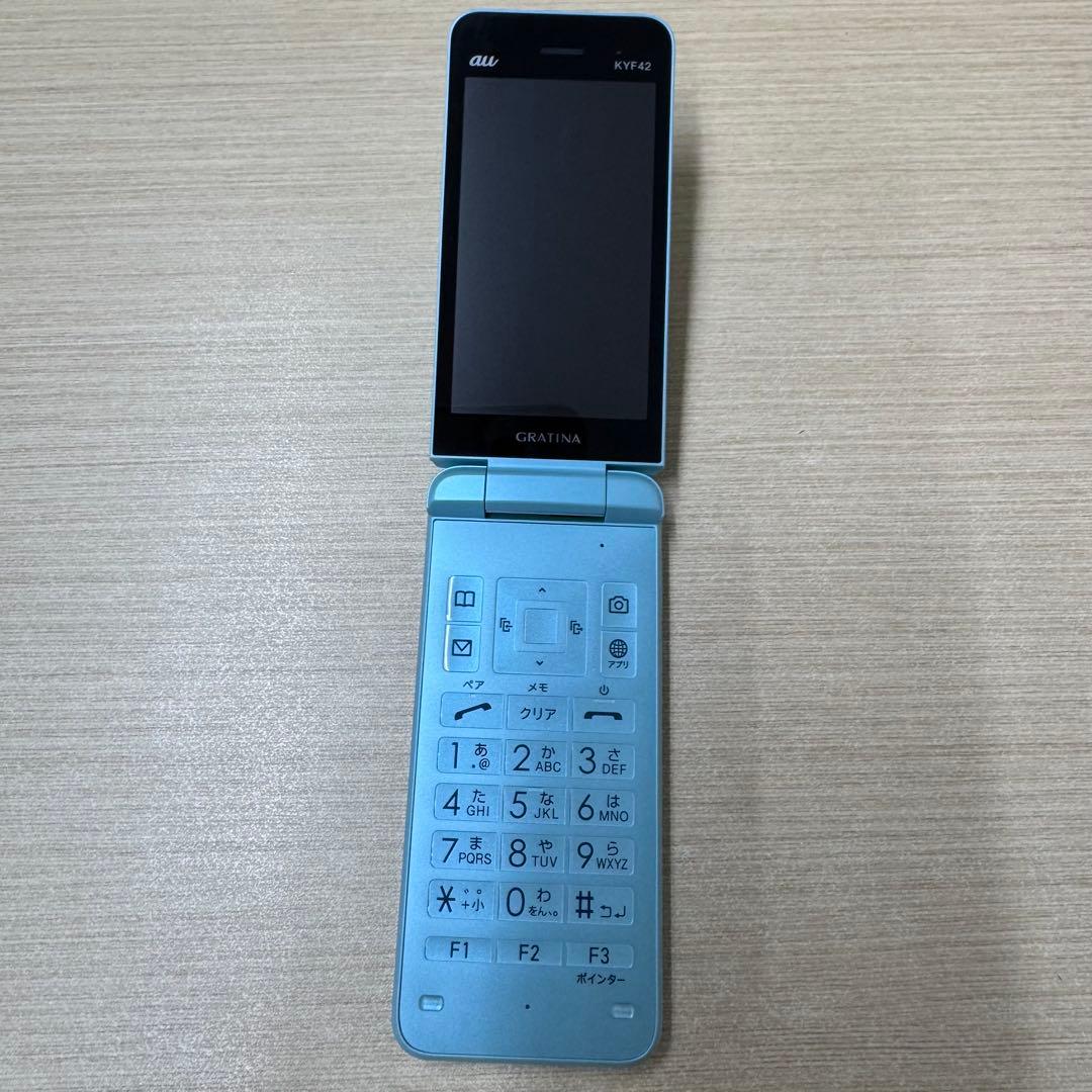 美品/SIMフリーGRATINA KYF42 ライトブルー 本体 ガラケー - メルカリ