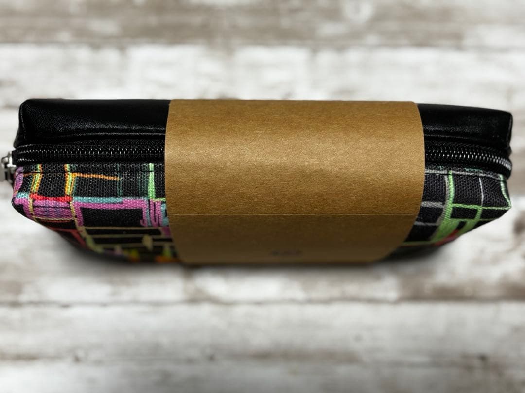 JAL ファーストクラストラベルポーチ HERBALORYコラボ - メルカリ