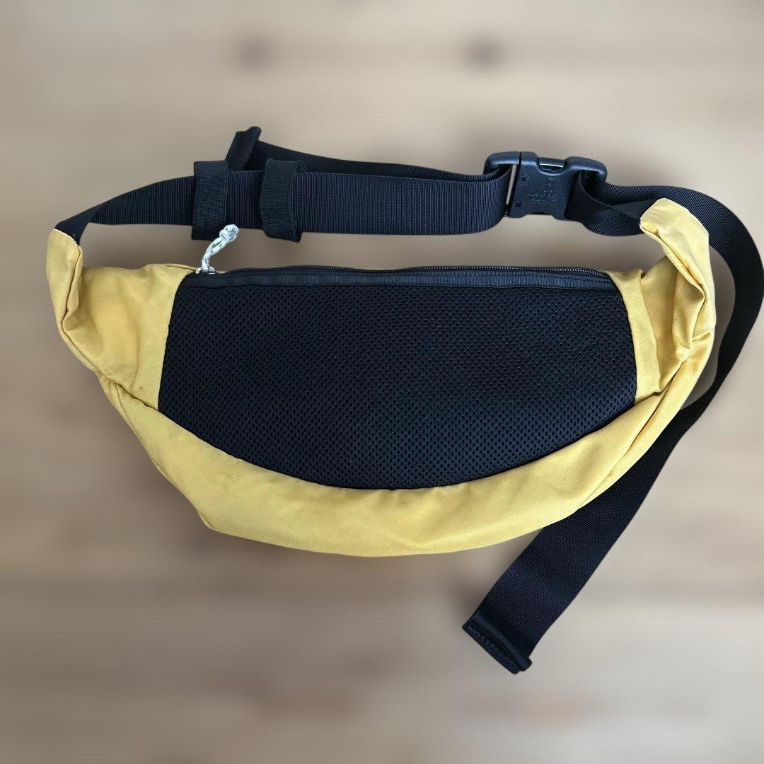 patagonia ボディバッグ イエロー - メルカリ