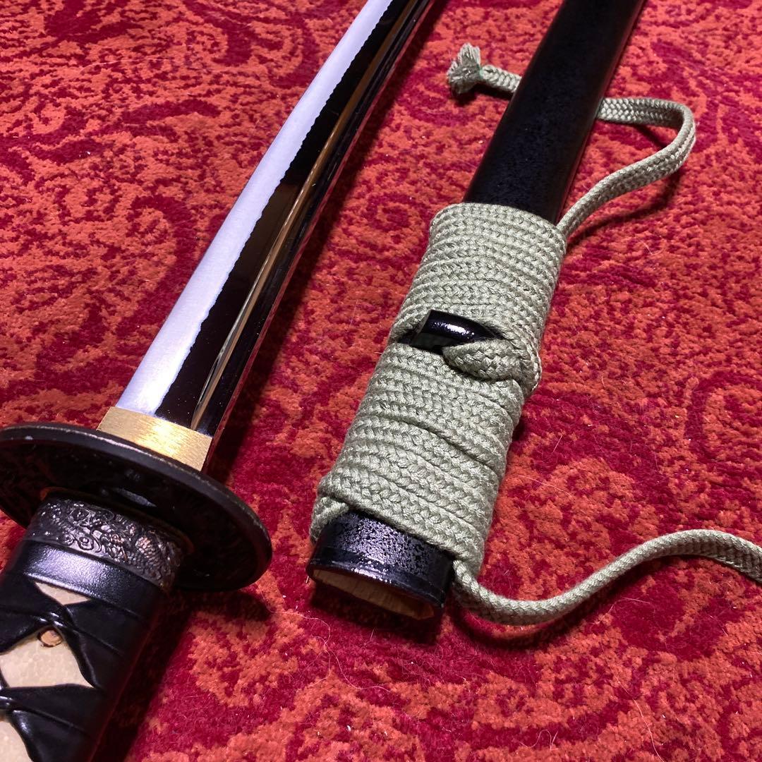 豪華居合刀 黒革巻柄 鶴松図楕円鍔 黒梨地鞘 - メルカリ