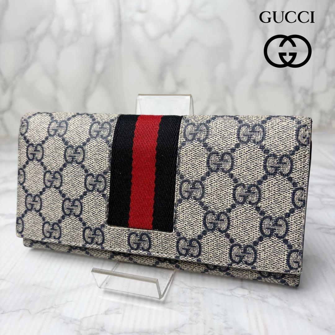 09 GUCCI 長財布 二つ折り財布 PVC GGスプリーム シェリーライン