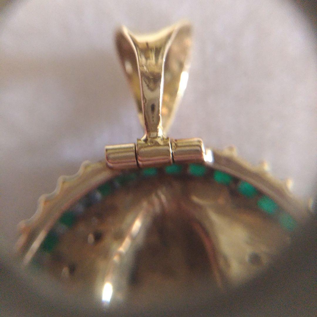 K18ペンダントトップ。菩薩像。仏様。ダイヤモンド。エメラルド。13.5g。中古