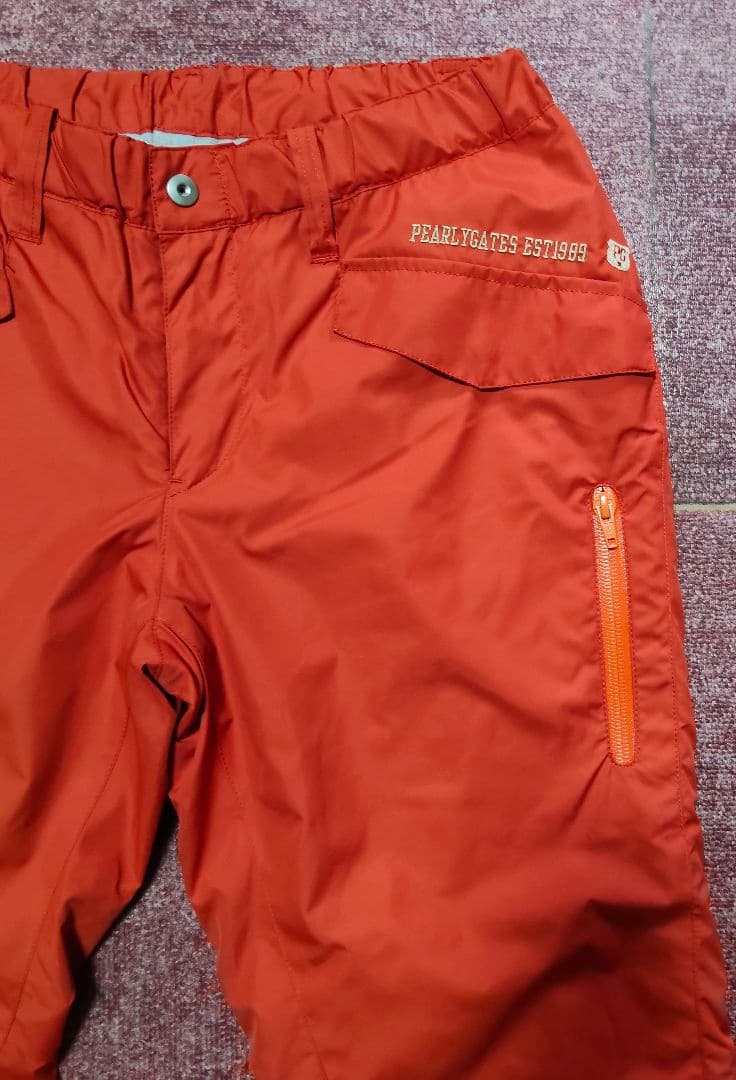 PEARLY GATES オレンジ（朱色）パンツ - メルカリ