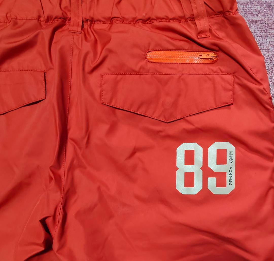 PEARLY GATES オレンジ（朱色）パンツ - メルカリ