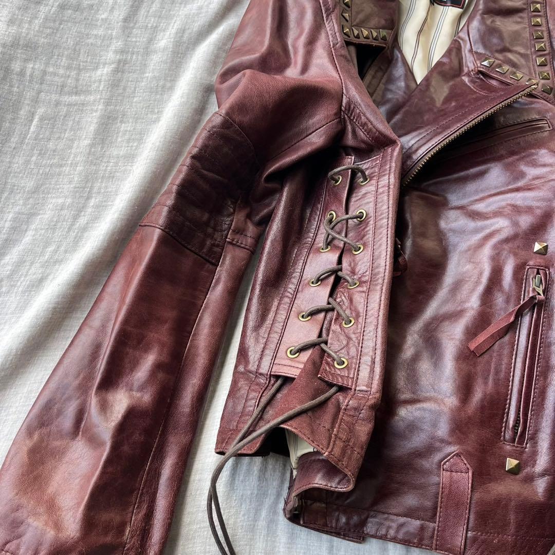 TORNADO MART raceup studs leather jacket - メルカリ