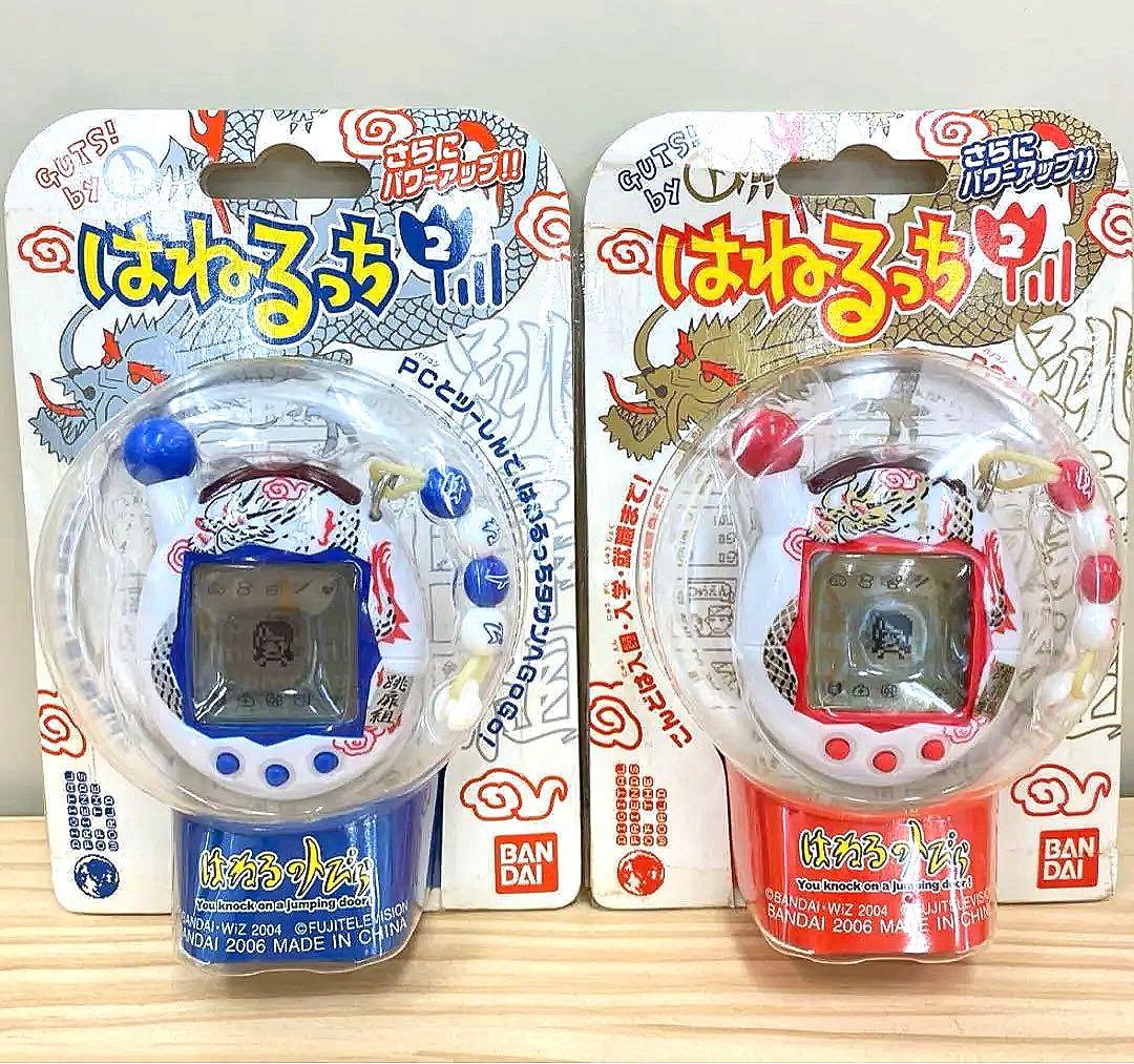 【未開封美品2個セット】はねるっち2 あか&こん　はねるのトビラ　たまごっち 動作確認済み たまごっち はねるっち2 あか こん 2個セット｜Yahoo