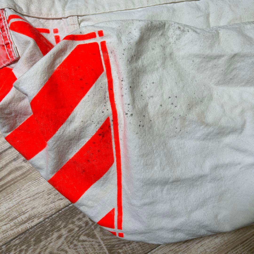 レア PLAIN DEALER ニュースペーパーバッグ オレンジ - メルカリ