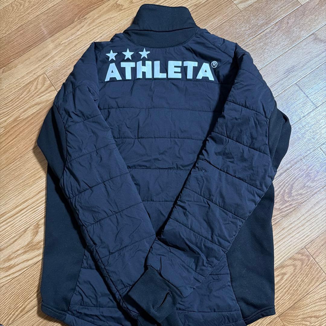 ATHLETA ピステ・ウィンドブレーカー M 黒 - メルカリ
