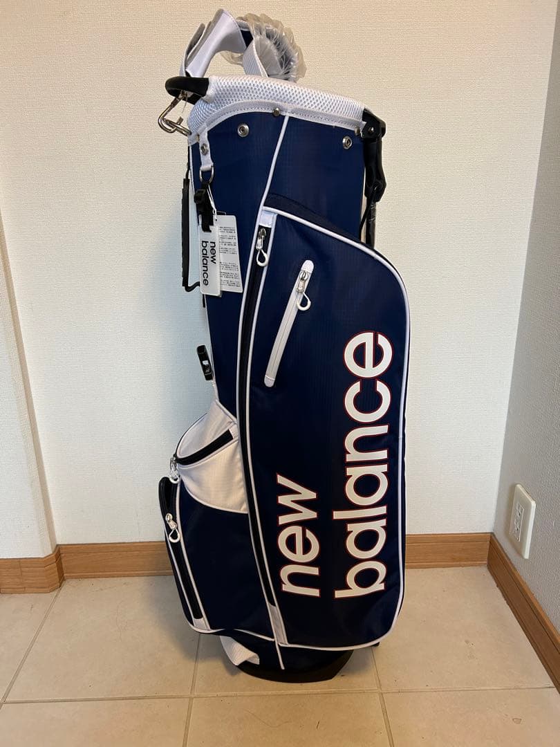ニューバランスゴルフキャディーバッグ（スタンド式 7.5型） - メルカリ
