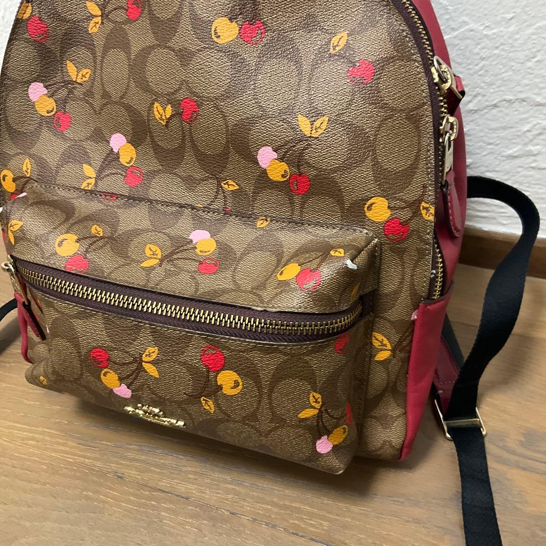 Coach チェリープリント リュック バックパック - メルカリ