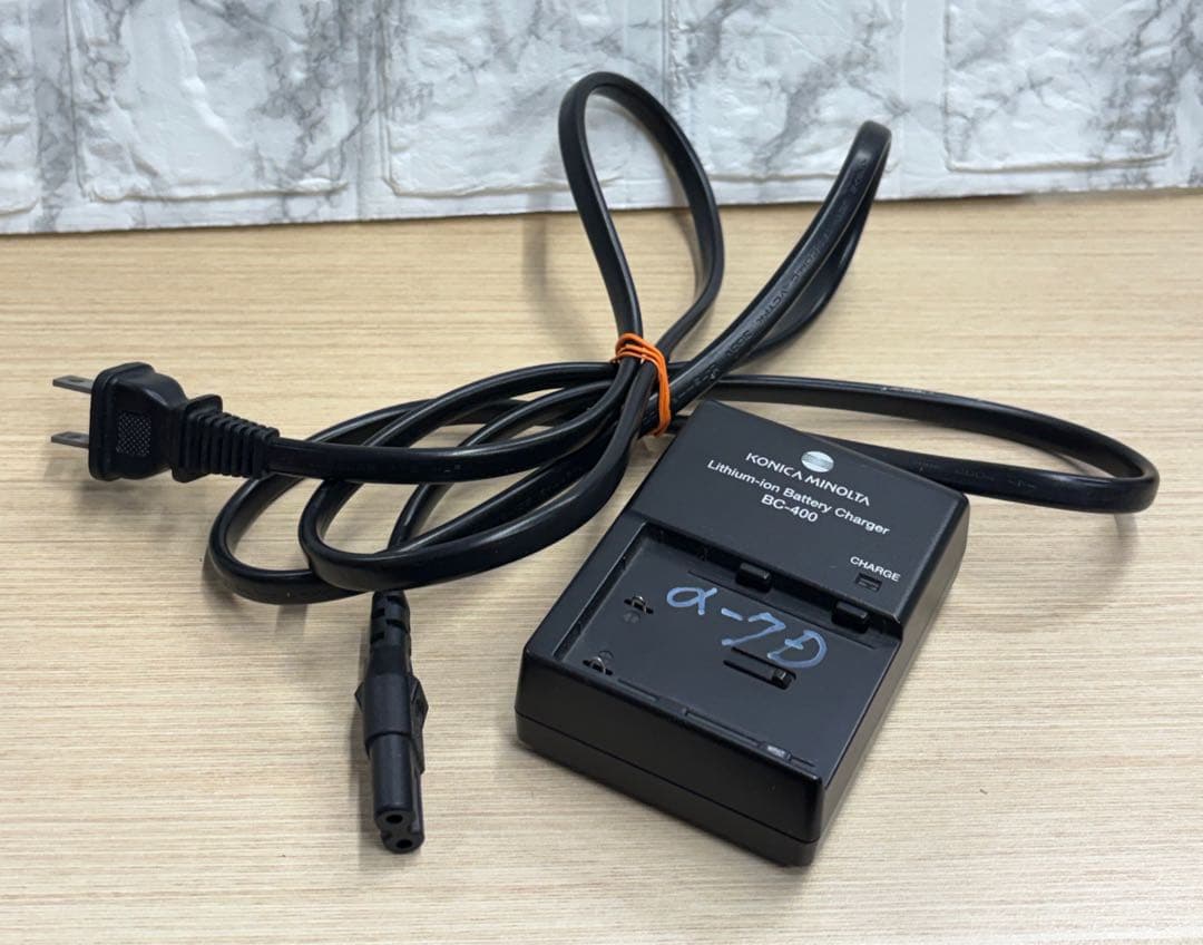 MINOLTA ミノルタ α−7 DIGITAL 訳あり‼️ 充電器付き - メルカリ