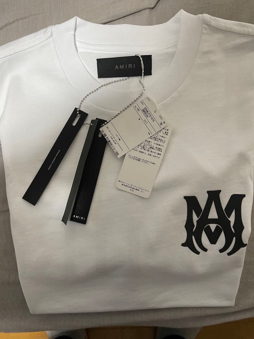 AMIRI ホワイト Tシャツ ロゴプリント 23730359_53688550_600.jpg