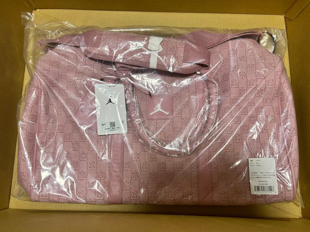 NIKE エアジョーダン モノグラム ダッフルバッグ ピンク - メルカリ