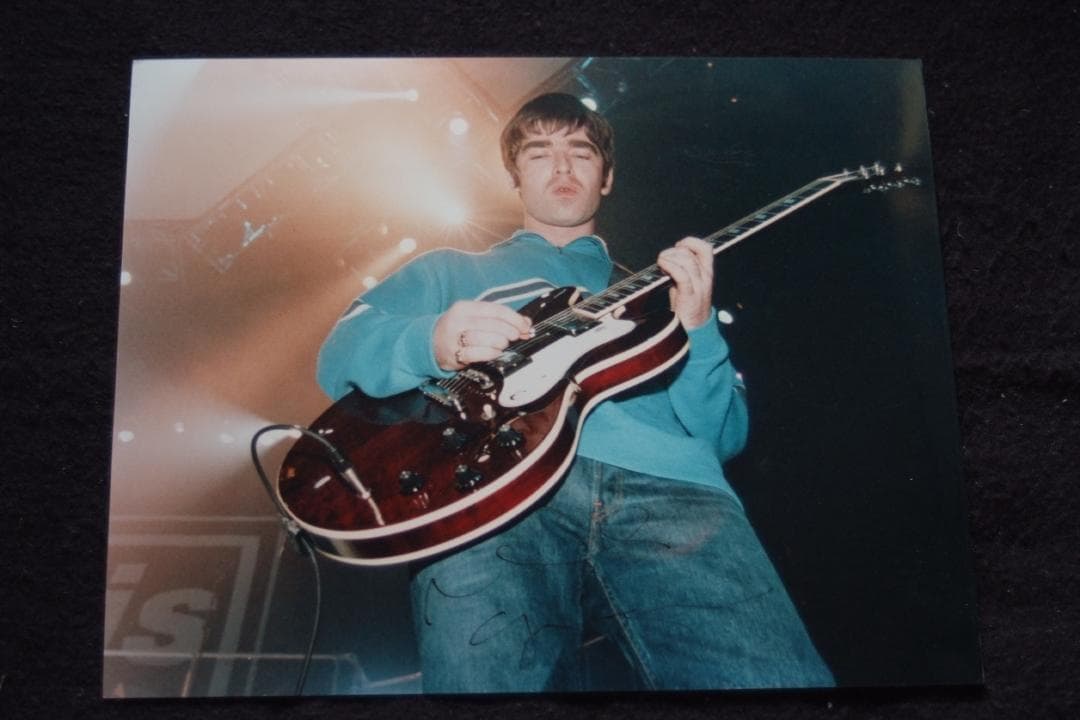 ノエル・ギャラガー(オアシス)-直筆サイン入りカラー写真 - メルカリ