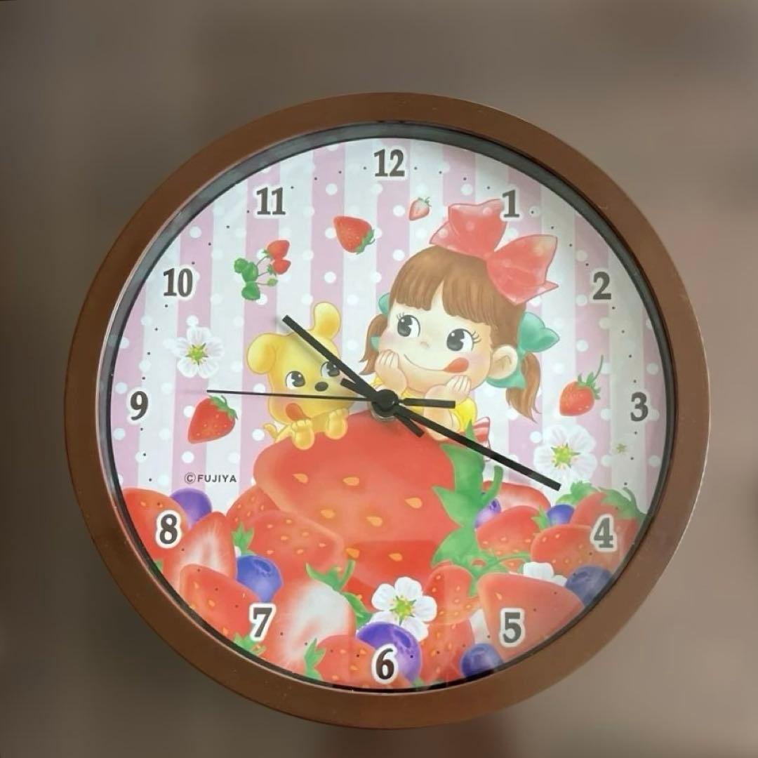 不二家】ペコちゃんフルーツ掛け時計 - メルカリ