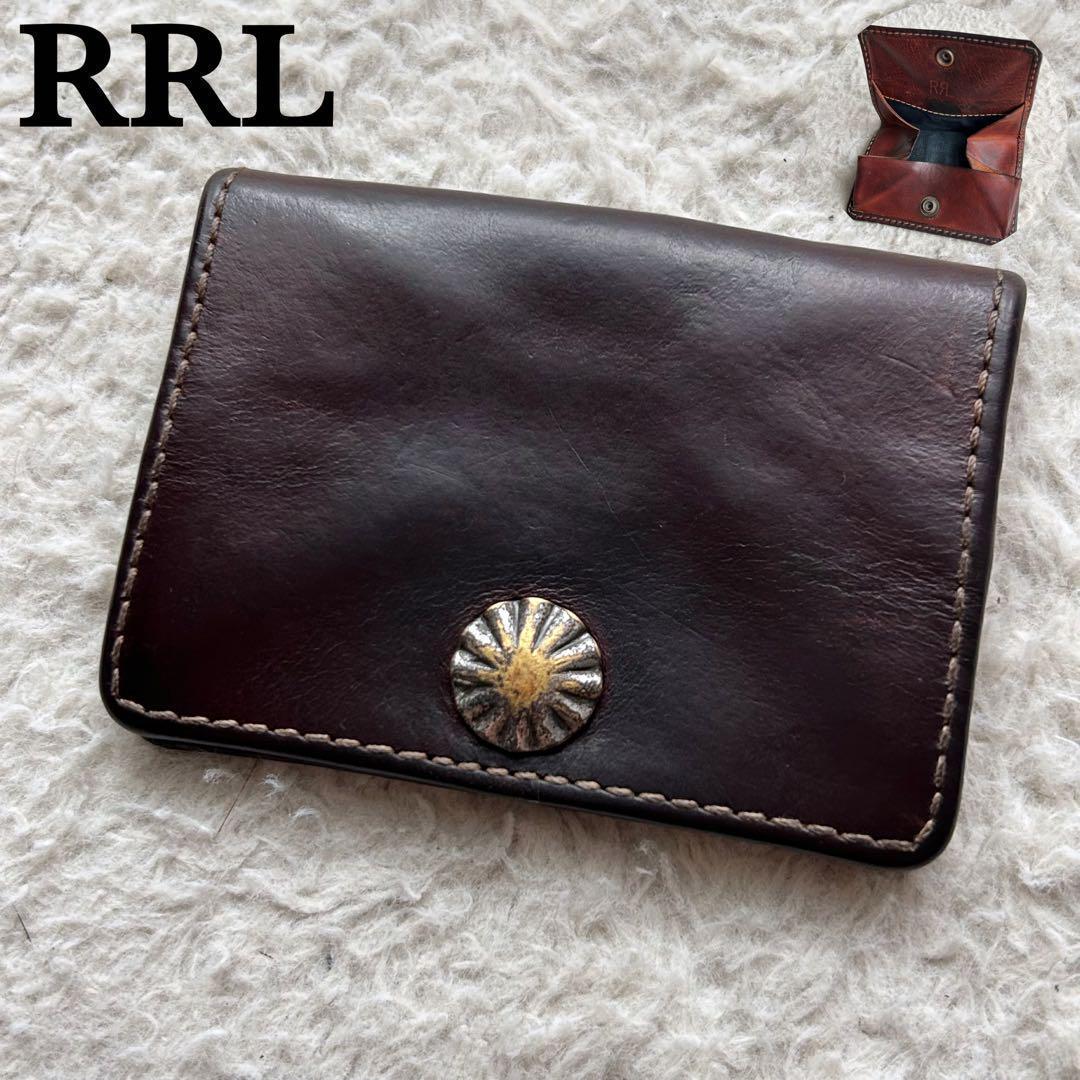 【激レア】ダブルアールエル ケース 小銭入れ レザー コンチョボタン 茶色 RRL等の通販サイト【RHYTHM】RRL(ダブルアールエル)RYDER WALLET