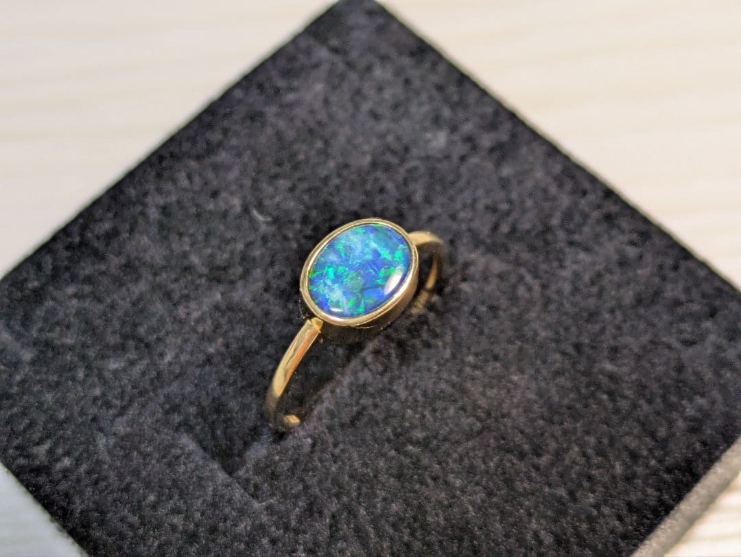 K18 0.77ct 12号 ボルダーオパールリング