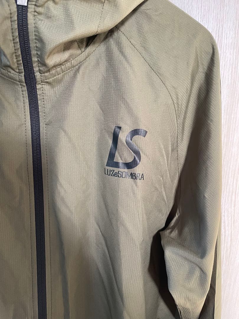 LUZeSOMBRA ピステ・ウィンドブレーカー オリーブ - メルカリ