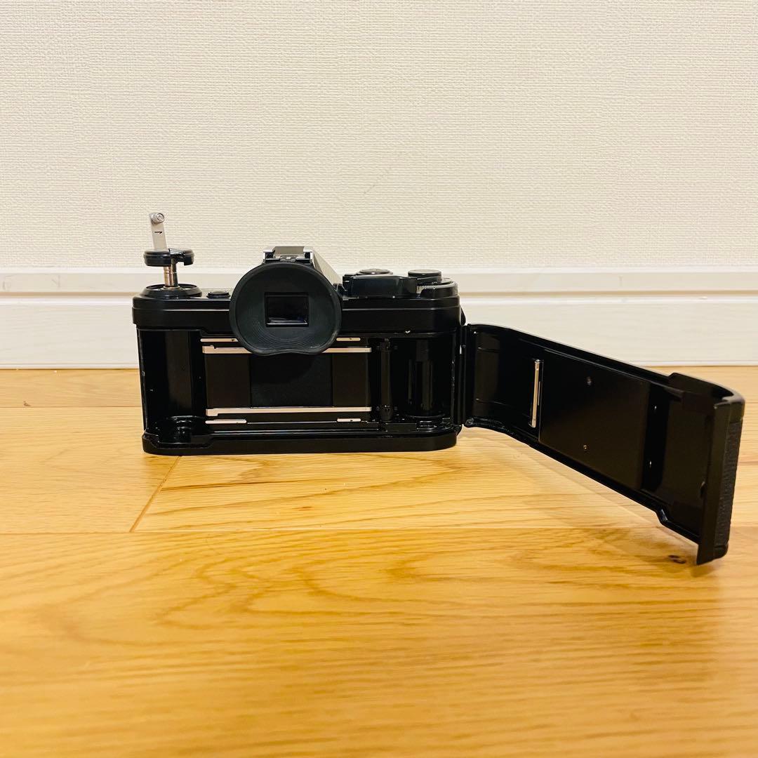 Canon AE1 フィルムカメラ ストロボ付き - メルカリ