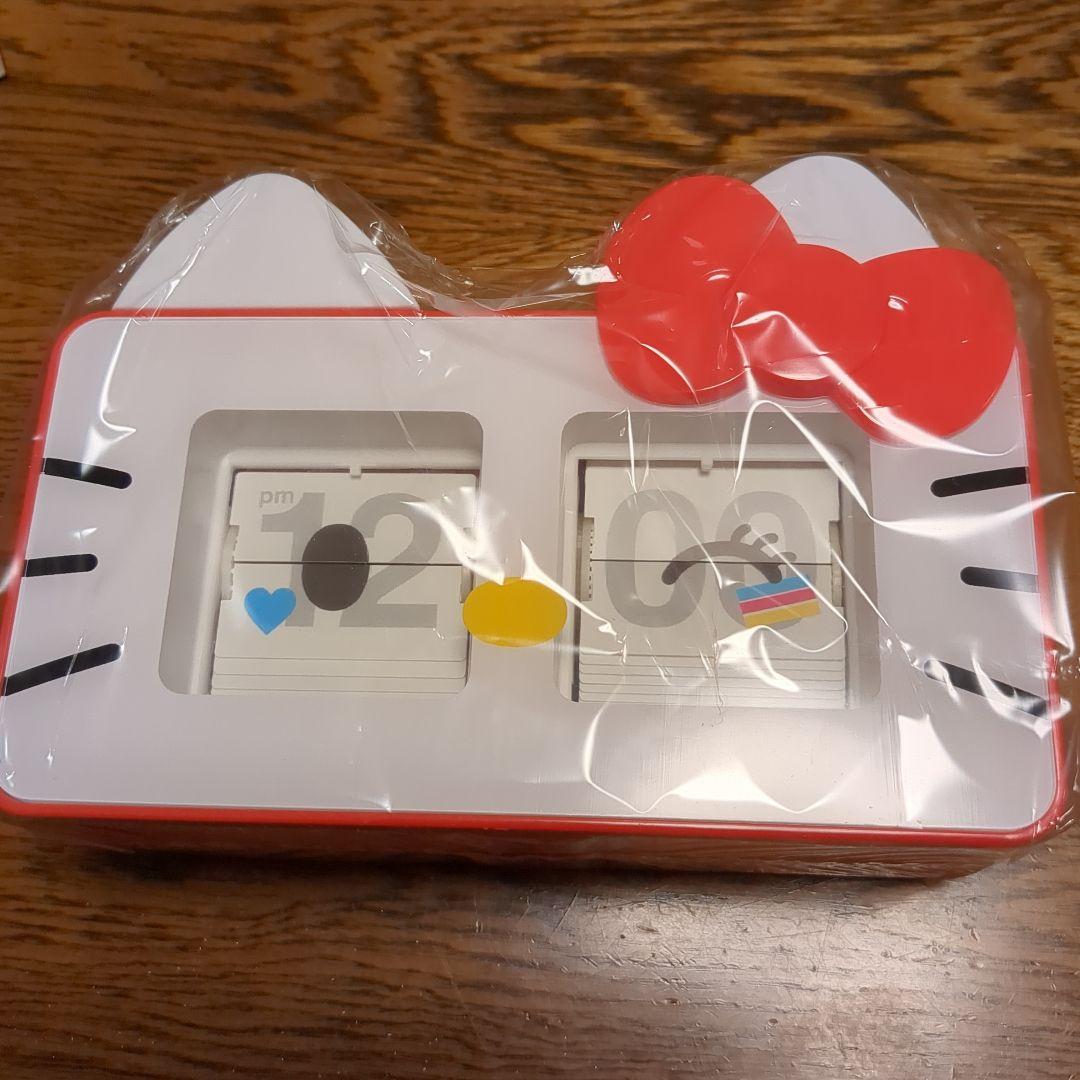 ハローキティ パタパタチェンジクロック - メルカリ