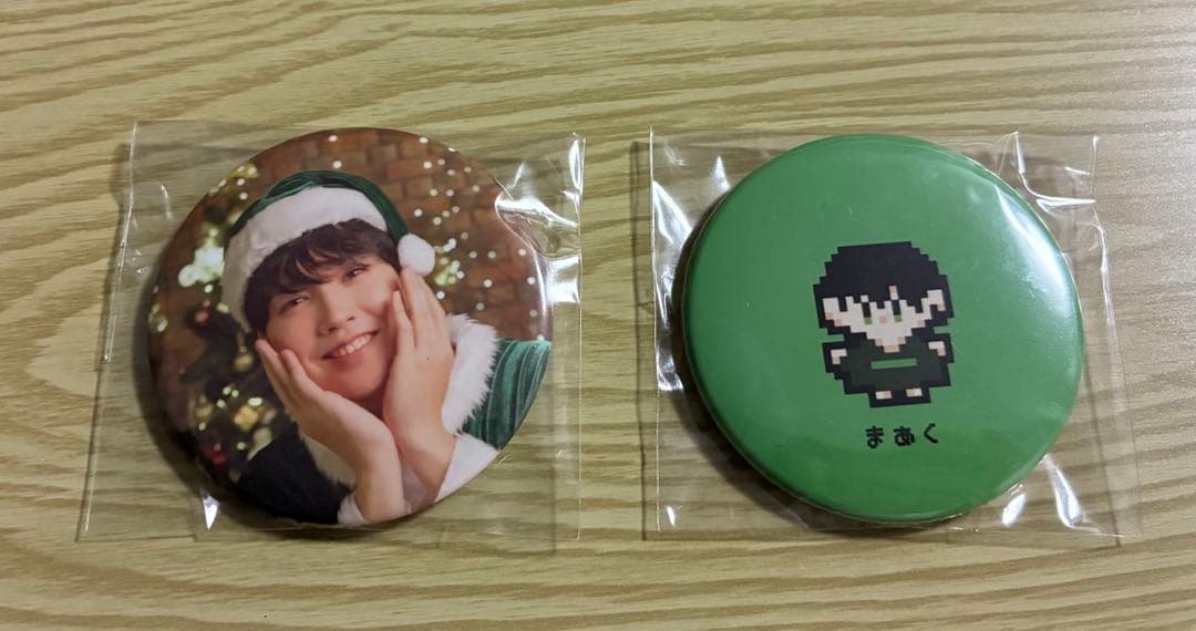 ニシコリ マーク 缶バッジ - メルカリ