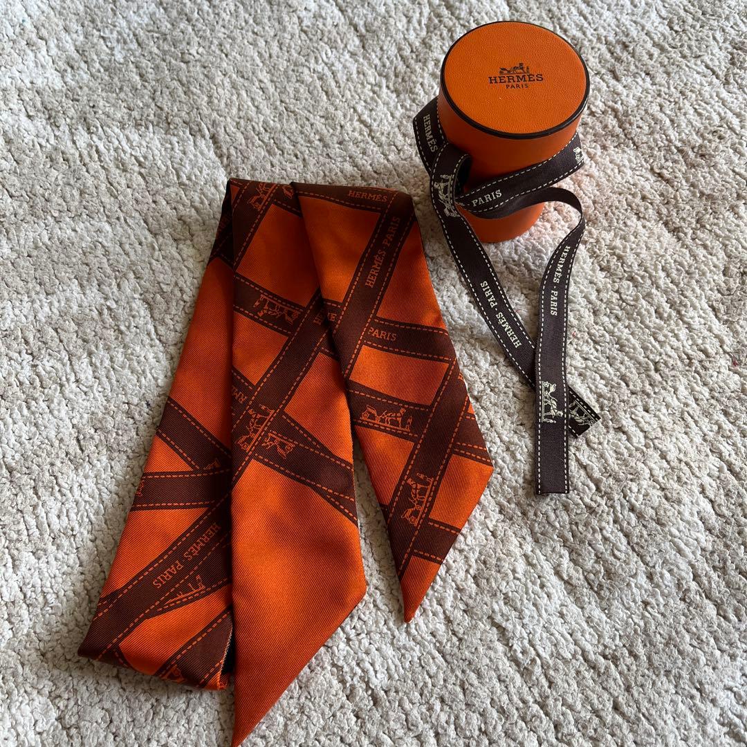 エルメス ツイリー オレンジ ブラウン ボルデュック リボン柄