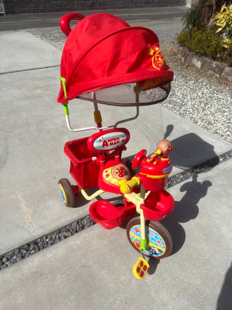 アンパンマン 三輪車 赤 日よけ付き - メルカリ