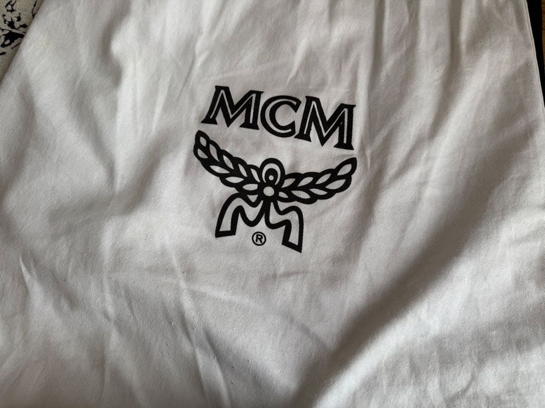 MCM ブラウンレザーリュック - メルカリ