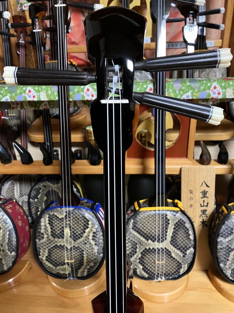 沖縄三線高級八重山黒木ウズラ➖与那城型本皮一枚張りスンチ塗り期間限定出品 沖縄三線高級八重山黒木ウズラ➖与那城型本皮一枚張りスンチ塗り期間